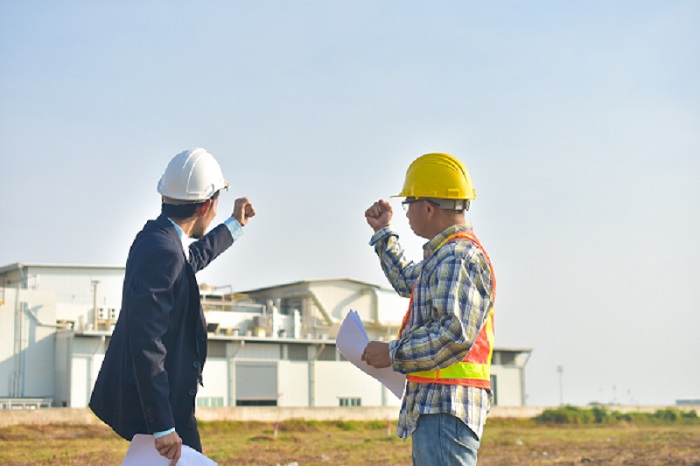 two engineers on the field