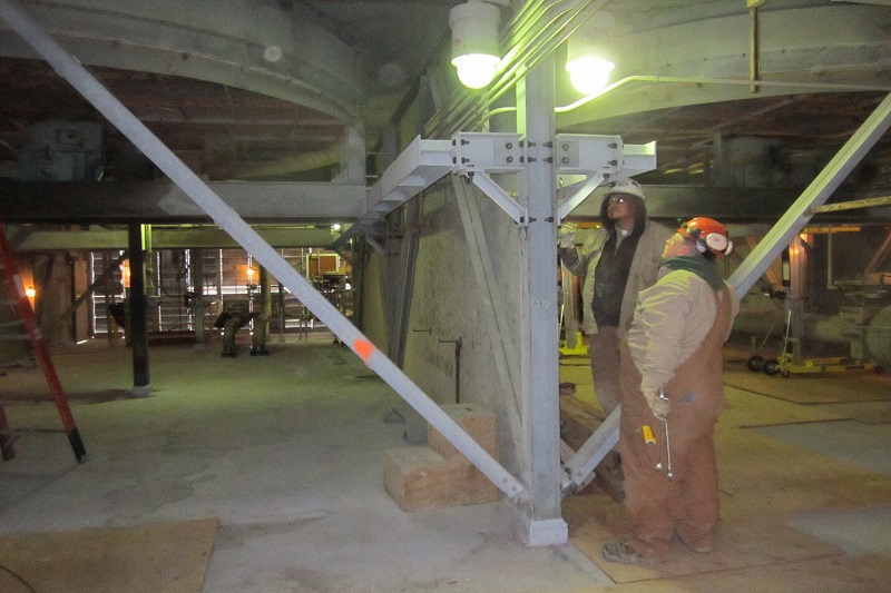 engineers working on a fin fan stiffening system