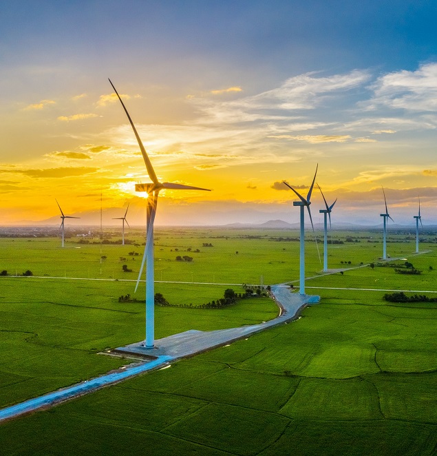 wind turbines in field wind turbines in field