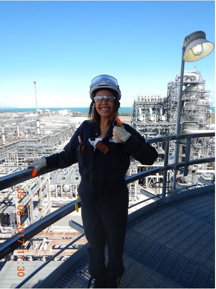 Alesia female engineer on site with hardhat on