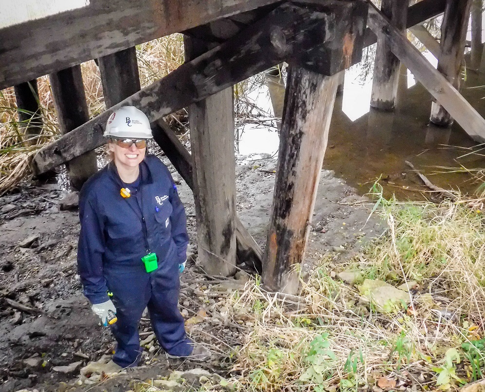 woman engineer on site under bridge