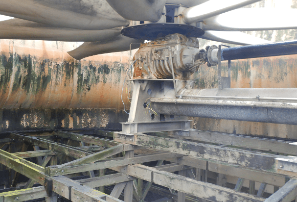 Internal inspection photo of the gearbox and fan blade Typical internal transverse and longitudinal framing in the plenum area (enclosed space between drift eliminators) of a crossflow cooling tower.